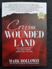 Picture of Cry the Wounded Land by Mark Holloway